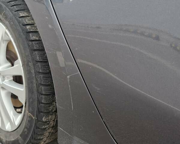 Серый Киа Сид, объемом двигателя 1.58 л и пробегом 213 тыс. км за 11300 $, фото 14 на Automoto.ua