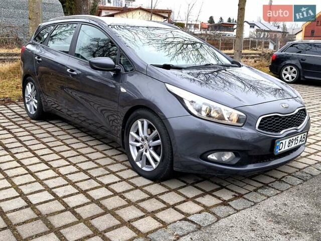 Серый Киа Сид, объемом двигателя 1.58 л и пробегом 230 тыс. км за 8000 $, фото 2 на Automoto.ua
