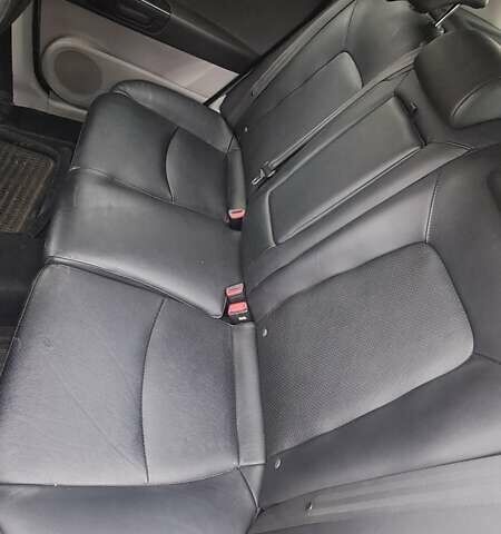 Синій Кіа Сід, об'ємом двигуна 2 л та пробігом 146 тис. км за 6000 $, фото 4 на Automoto.ua