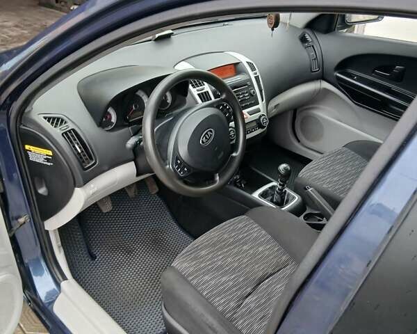 Синій Кіа Сід, об'ємом двигуна 2 л та пробігом 215 тис. км за 3850 $, фото 6 на Automoto.ua