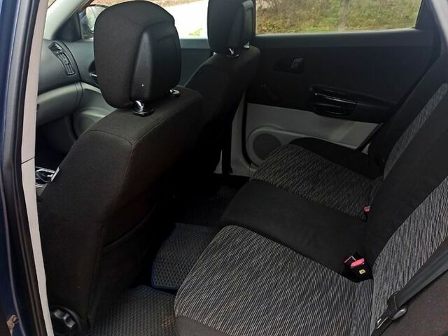 Синий Киа Сид, объемом двигателя 2 л и пробегом 217 тыс. км за 5499 $, фото 6 на Automoto.ua