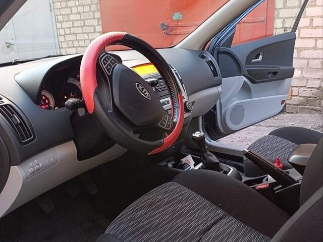 Синий Киа Сид, объемом двигателя 2 л и пробегом 193 тыс. км за 6100 $, фото 32 на Automoto.ua