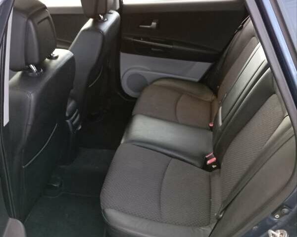 Синий Киа Сид, объемом двигателя 1.59 л и пробегом 259 тыс. км за 6000 $, фото 7 на Automoto.ua