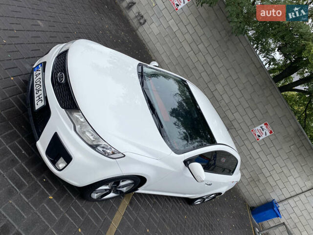 Белый Киа Cerato KOUP, объемом двигателя 2 л и пробегом 237 тыс. км за 8100 $, фото 4 на Automoto.ua