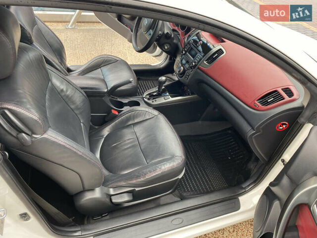 Белый Киа Cerato KOUP, объемом двигателя 2 л и пробегом 237 тыс. км за 8100 $, фото 11 на Automoto.ua