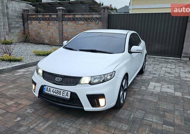 Белый Киа Cerato KOUP, объемом двигателя 2 л и пробегом 138 тыс. км за 8300 $, фото 1 на Automoto.ua