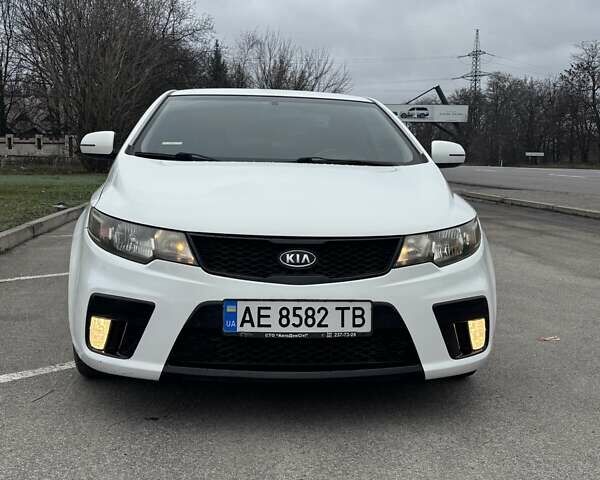Білий Кіа Cerato KOUP, об'ємом двигуна 2 л та пробігом 174 тис. км за 8500 $, фото 1 на Automoto.ua