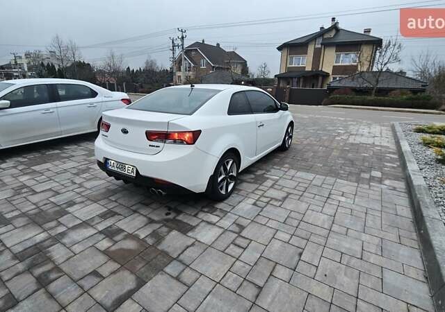 Белый Киа Cerato KOUP, объемом двигателя 2 л и пробегом 138 тыс. км за 8300 $, фото 4 на Automoto.ua