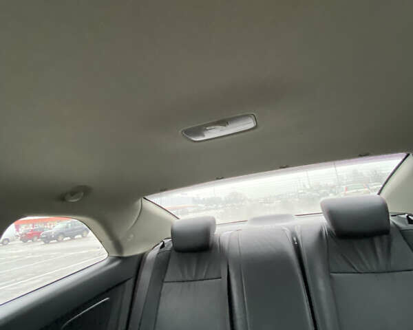 Білий Кіа Cerato KOUP, об'ємом двигуна 2 л та пробігом 87 тис. км за 9800 $, фото 7 на Automoto.ua