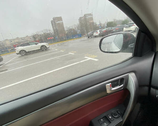 Білий Кіа Cerato KOUP, об'ємом двигуна 2 л та пробігом 87 тис. км за 9800 $, фото 8 на Automoto.ua