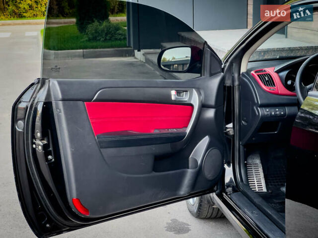Чорний Кіа Cerato KOUP, об'ємом двигуна 2 л та пробігом 265 тис. км за 6800 $, фото 21 на Automoto.ua