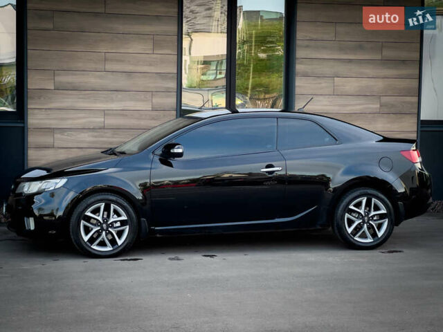 Чорний Кіа Cerato KOUP, об'ємом двигуна 2 л та пробігом 265 тис. км за 6800 $, фото 15 на Automoto.ua