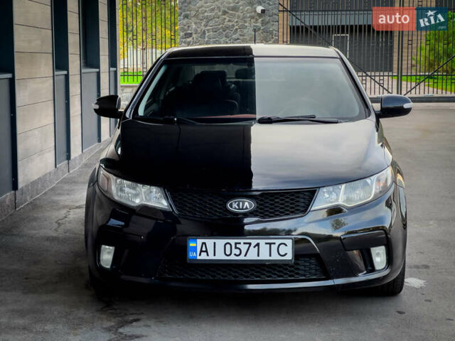 Чорний Кіа Cerato KOUP, об'ємом двигуна 2 л та пробігом 265 тис. км за 6800 $, фото 20 на Automoto.ua