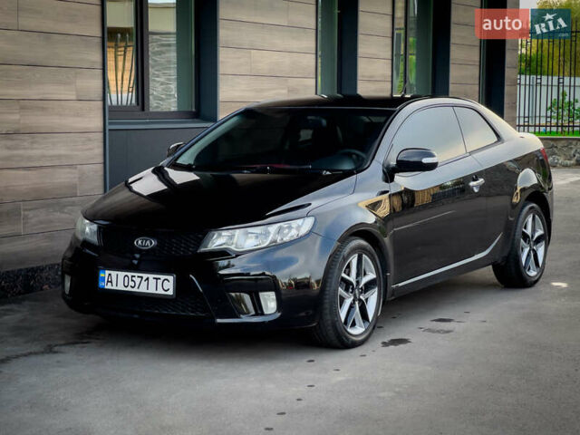 Чорний Кіа Cerato KOUP, об'ємом двигуна 2 л та пробігом 265 тис. км за 6800 $, фото 18 на Automoto.ua