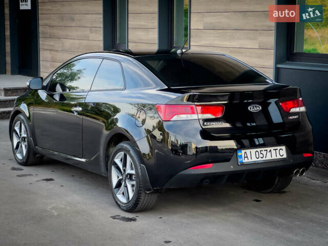 Чорний Кіа Cerato KOUP, об'ємом двигуна 2 л та пробігом 265 тис. км за 6800 $, фото 11 на Automoto.ua