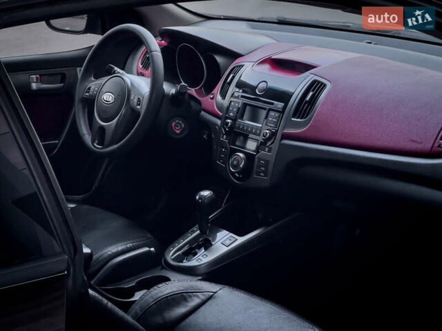 Чорний Кіа Cerato KOUP, об'ємом двигуна 2 л та пробігом 265 тис. км за 6800 $, фото 27 на Automoto.ua