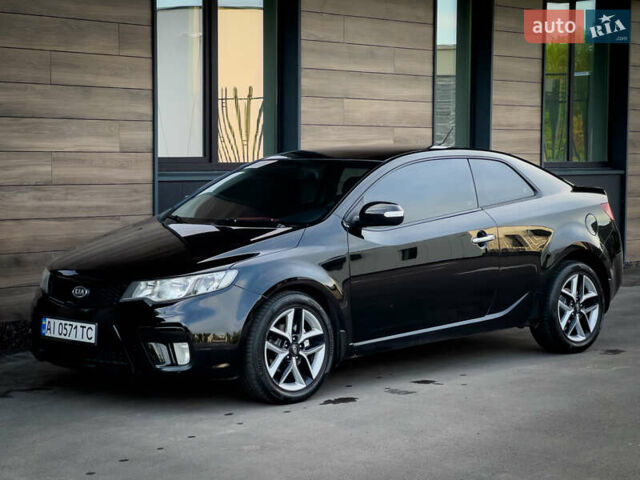 Чорний Кіа Cerato KOUP, об'ємом двигуна 2 л та пробігом 265 тис. км за 6800 $, фото 17 на Automoto.ua