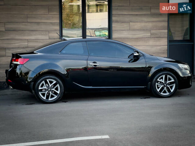 Чорний Кіа Cerato KOUP, об'ємом двигуна 2 л та пробігом 265 тис. км за 6800 $, фото 3 на Automoto.ua