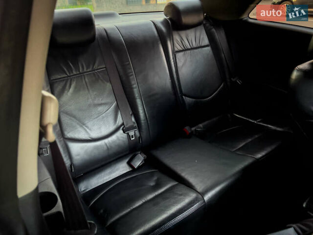 Чорний Кіа Cerato KOUP, об'ємом двигуна 2 л та пробігом 265 тис. км за 6800 $, фото 29 на Automoto.ua