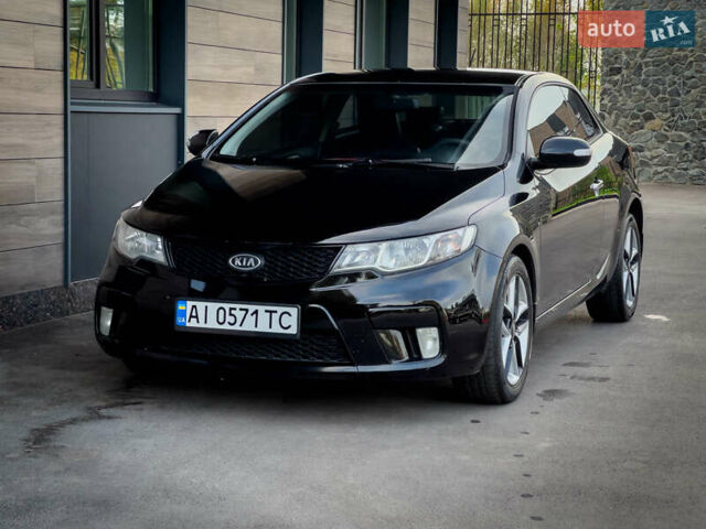 Чорний Кіа Cerato KOUP, об'ємом двигуна 2 л та пробігом 265 тис. км за 6800 $, фото 19 на Automoto.ua