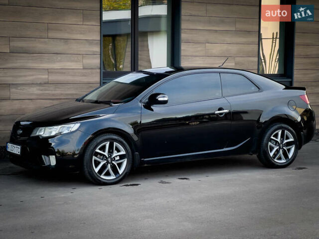 Чорний Кіа Cerato KOUP, об'ємом двигуна 2 л та пробігом 265 тис. км за 6800 $, фото 16 на Automoto.ua