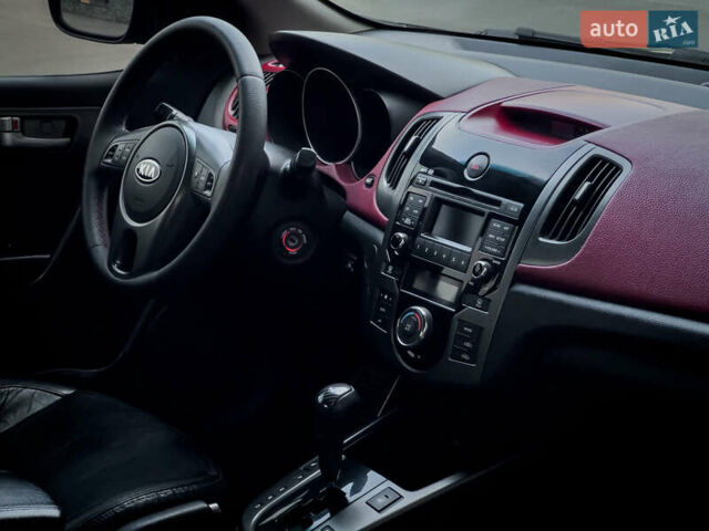 Чорний Кіа Cerato KOUP, об'ємом двигуна 2 л та пробігом 265 тис. км за 6800 $, фото 26 на Automoto.ua