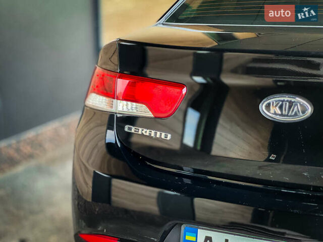 Чорний Кіа Cerato KOUP, об'ємом двигуна 2 л та пробігом 265 тис. км за 6800 $, фото 10 на Automoto.ua