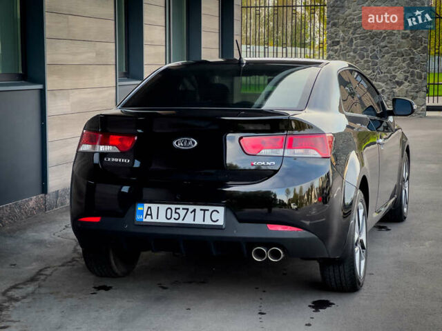 Чорний Кіа Cerato KOUP, об'ємом двигуна 2 л та пробігом 265 тис. км за 6800 $, фото 7 на Automoto.ua