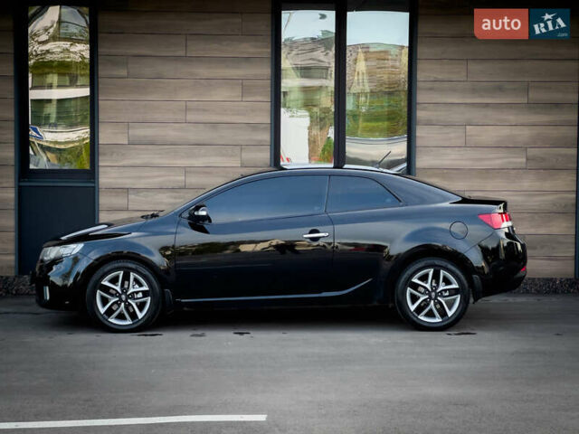 Чорний Кіа Cerato KOUP, об'ємом двигуна 2 л та пробігом 265 тис. км за 6800 $, фото 14 на Automoto.ua