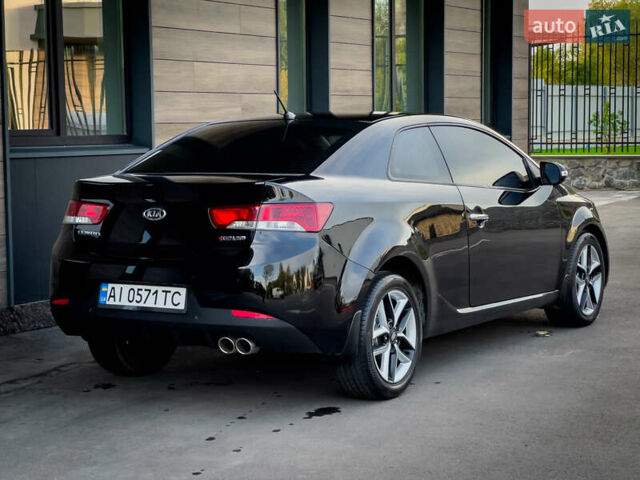 Чорний Кіа Cerato KOUP, об'ємом двигуна 2 л та пробігом 265 тис. км за 6800 $, фото 6 на Automoto.ua