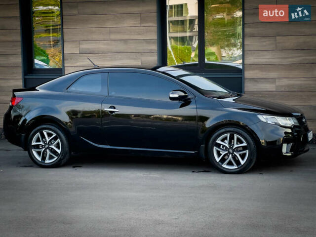 Чорний Кіа Cerato KOUP, об'ємом двигуна 2 л та пробігом 265 тис. км за 6800 $, фото 2 на Automoto.ua