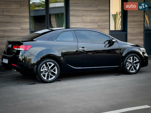 Чорний Кіа Cerato KOUP, об'ємом двигуна 2 л та пробігом 265 тис. км за 6800 $, фото 4 на Automoto.ua