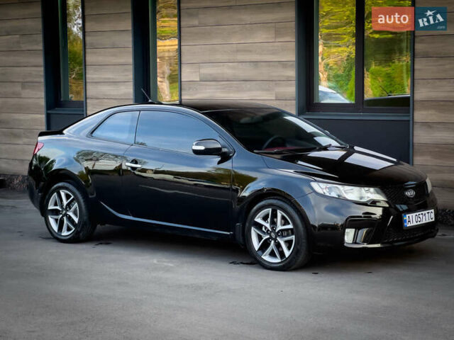 Чорний Кіа Cerato KOUP, об'ємом двигуна 2 л та пробігом 265 тис. км за 6800 $, фото 1 на Automoto.ua