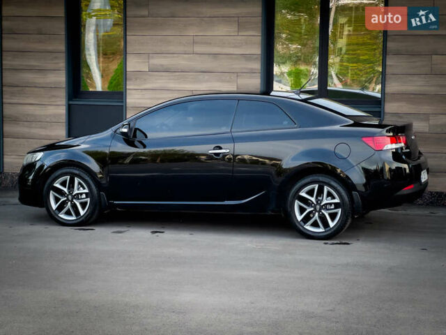 Чорний Кіа Cerato KOUP, об'ємом двигуна 2 л та пробігом 265 тис. км за 6800 $, фото 13 на Automoto.ua