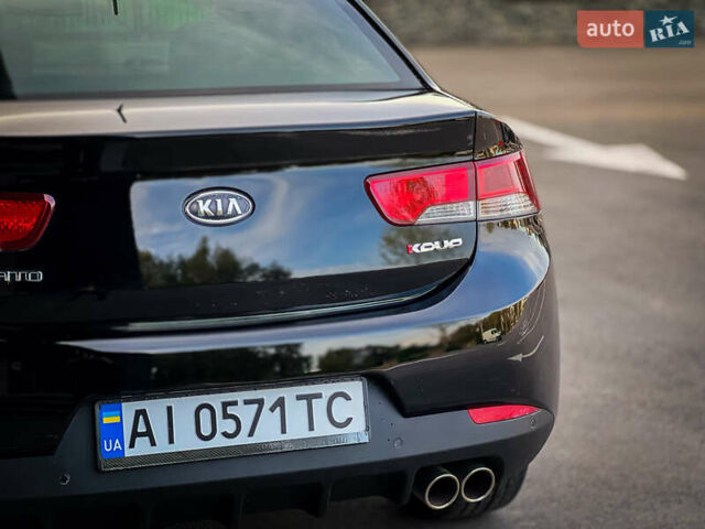 Чорний Кіа Cerato KOUP, об'ємом двигуна 2 л та пробігом 265 тис. км за 6800 $, фото 9 на Automoto.ua