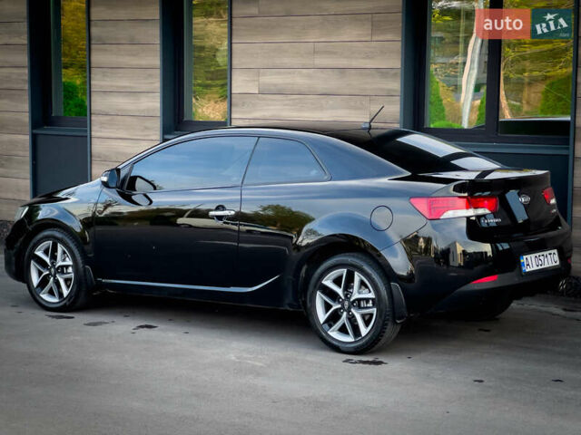 Чорний Кіа Cerato KOUP, об'ємом двигуна 2 л та пробігом 265 тис. км за 6800 $, фото 12 на Automoto.ua
