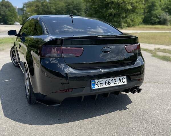 Черный Киа Cerato KOUP, объемом двигателя 2.4 л и пробегом 210 тыс. км за 9000 $, фото 3 на Automoto.ua