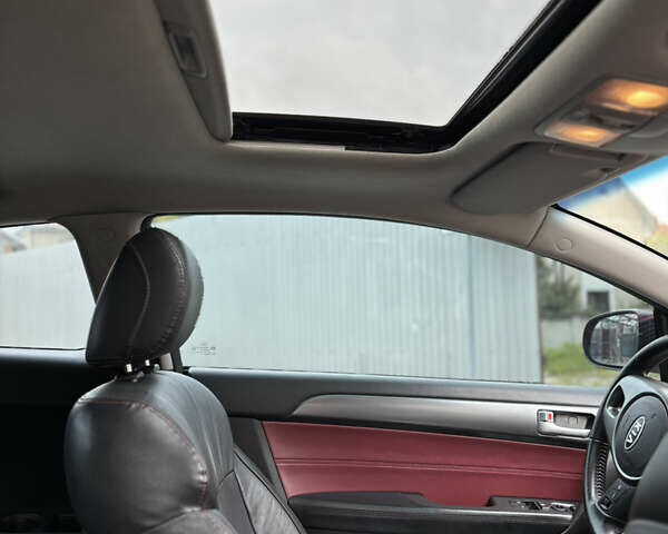 Черный Киа Cerato KOUP, объемом двигателя 2 л и пробегом 204 тыс. км за 8000 $, фото 10 на Automoto.ua