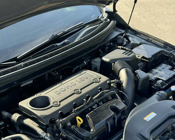 Черный Киа Cerato KOUP, объемом двигателя 2.4 л и пробегом 210 тыс. км за 9000 $, фото 28 на Automoto.ua