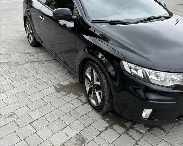 Черный Киа Cerato KOUP, объемом двигателя 2 л и пробегом 204 тыс. км за 8000 $, фото 1 на Automoto.ua