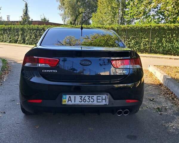 Черный Киа Cerato KOUP, объемом двигателя 2 л и пробегом 175 тыс. км за 6999 $, фото 9 на Automoto.ua
