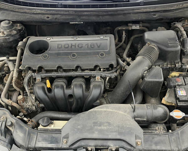 Черный Киа Cerato KOUP, объемом двигателя 2 л и пробегом 230 тыс. км за 8000 $, фото 20 на Automoto.ua