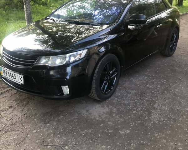 Черный Киа Cerato KOUP, объемом двигателя 2 л и пробегом 230 тыс. км за 8000 $, фото 4 на Automoto.ua
