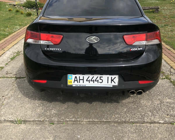Черный Киа Cerato KOUP, объемом двигателя 2 л и пробегом 230 тыс. км за 8000 $, фото 21 на Automoto.ua