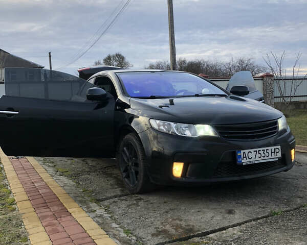 Черный Киа Cerato KOUP, объемом двигателя 2 л и пробегом 230 тыс. км за 8000 $, фото 2 на Automoto.ua