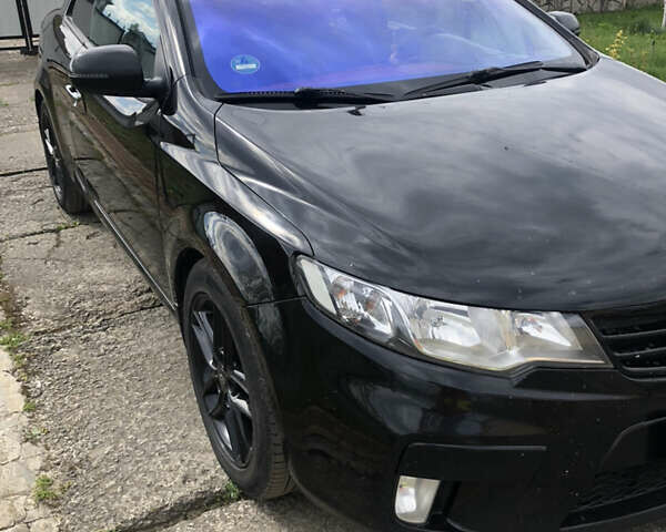 Черный Киа Cerato KOUP, объемом двигателя 2 л и пробегом 230 тыс. км за 8000 $, фото 8 на Automoto.ua