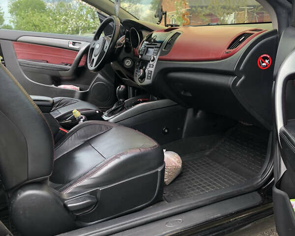 Черный Киа Cerato KOUP, объемом двигателя 2 л и пробегом 230 тыс. км за 8000 $, фото 13 на Automoto.ua