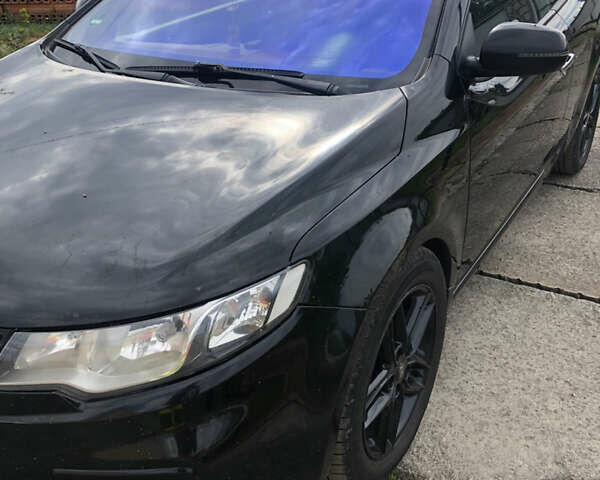 Черный Киа Cerato KOUP, объемом двигателя 2 л и пробегом 230 тыс. км за 8000 $, фото 7 на Automoto.ua