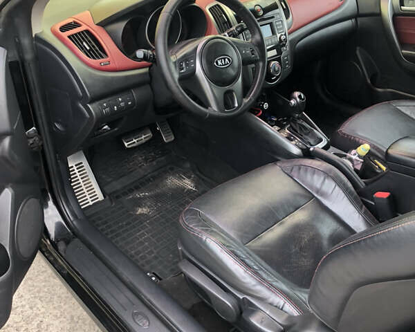 Черный Киа Cerato KOUP, объемом двигателя 2 л и пробегом 230 тыс. км за 8000 $, фото 14 на Automoto.ua