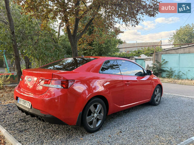 Красный Киа Cerato KOUP, объемом двигателя 1.6 л и пробегом 167 тыс. км за 7000 $, фото 5 на Automoto.ua